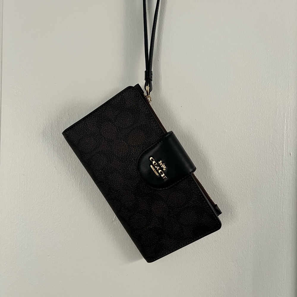 New Coach Black and Brown Signature Wristlet tags just missing